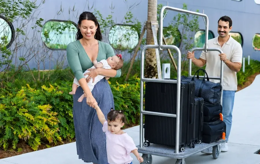Family arriving in Orlando with luggage